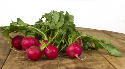 Fresh radish on wooden table