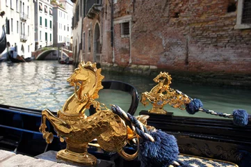 Wall murals Gondolas Close-up gondola on canal in Venice