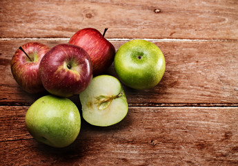 Apples on wooden background