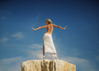 Half naked woman showing her back