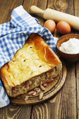 Pie with cabbage and sausages