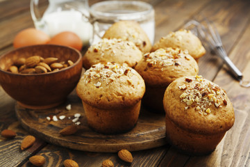 Homemade muffins with almonds - 71302954