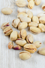 pistachio on wooden surface