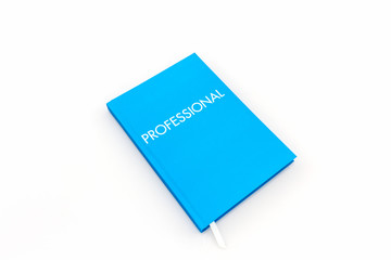Blue diary book with the word" professional".