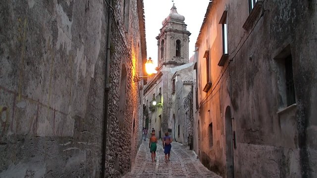 Tourists on the cobbled streets of the medieval Erice city