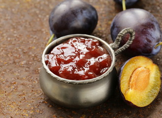 natural organic plum jam with fresh berries