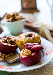 sweet baked apples with walnuts, cinnamon and honey,autumn