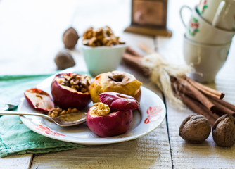 sweet baked apples with walnuts, cinnamon and honey,christmas