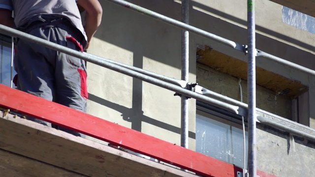Man working on scaffolding
