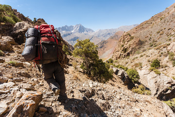 Hiker in high mountains.