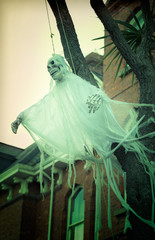 Scary ghost decoration for halloween outside of the house