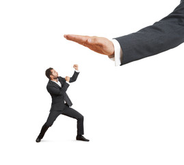 angry businessman under big palm