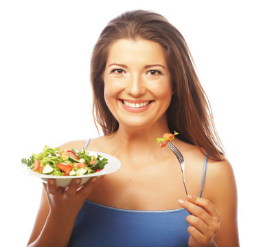 happy woman eating salad