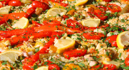 paella valenciana with seafood and vegetables