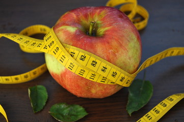 Apple and measurement tape