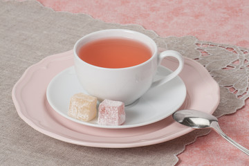 Assorted Turkish Delight. Cup Of Fruit Tea. Natural Linen Napkin