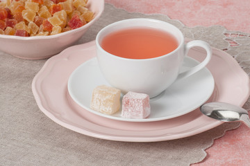Assorted Turkish Delight. Cup Of Fruit Tea. Natural Linen Napkin