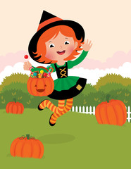 Girl in witch costume celebrates Halloween