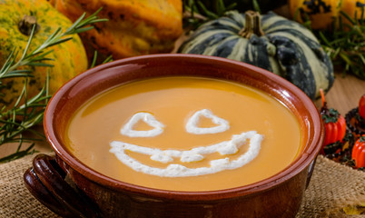 Pumpkin soup for Halloween party, close-up