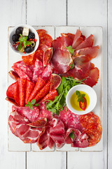antipasti Platter of Cured Meat,   jamon, sausage, salame on whi