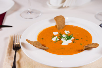 Plate of delicious pumpkin or butternut soup