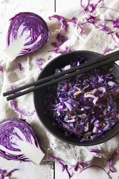 sauteed purple cabbage on japanese bowl with chopsticks