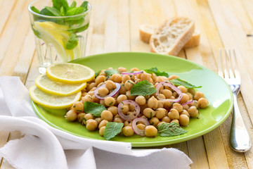 Vegetarian chickpeas salad with mint and spices