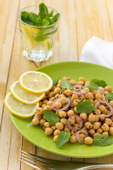 Vegetarian chickpeas salad with mint and spices