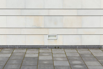 Fototapeta premium square floor with modern stone wall