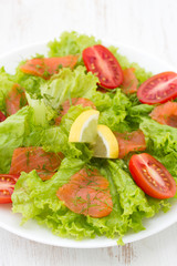 salad with smoked fish on plate