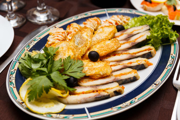 Dish with sliced meat products