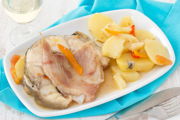 fish stew on white dish