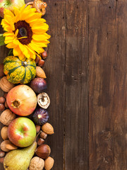Obraz na płótnie Canvas Autumn border on a wooden table