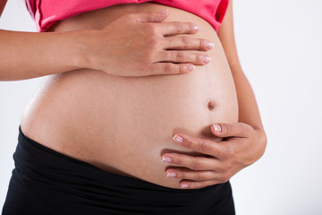 Close-up of pregnant woman's belly