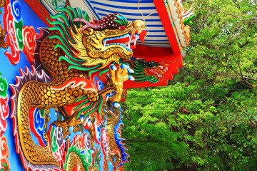 Chinese dragons statue on the wall.