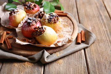 Baked apples on table close up