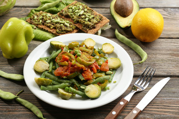 Healthy salad with peas and asparagus served