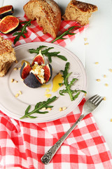 Ripe sweet fig with cottage cheese and honey, on plate