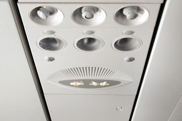 No smoking and fasten seat belt sign on an airplane