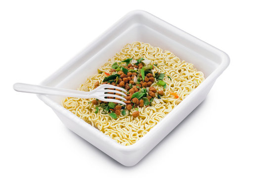 Uncooked fast food vermicelli with fork