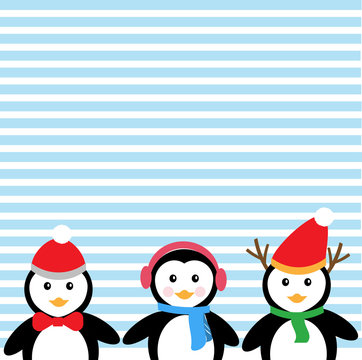 Blue background and penguins for Christmas Holiday