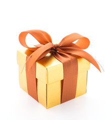 Gold gift box isolated on white background