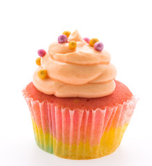 Colorful cupcakes isolated on white