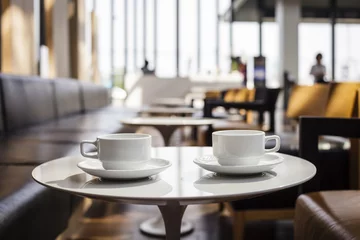 Fotobehang Twee kopjes koffie in de coffeeshop © VTT Studio