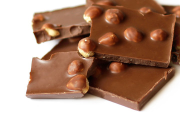 Chocolate pieces with nuts close-up