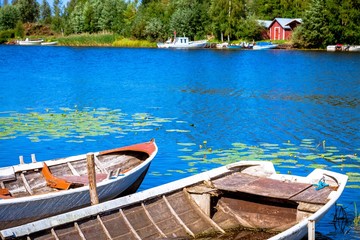 two old fishing wooden rowboats