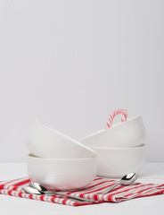 Christmas Candy Cane. White Bowls. Red White Napkin