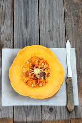 pumpkin on wooden board