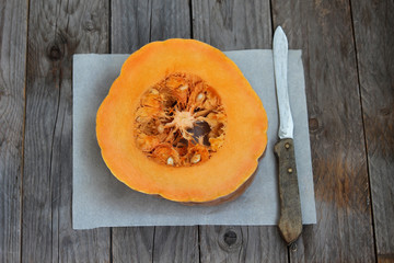 pumpkin on wooden board