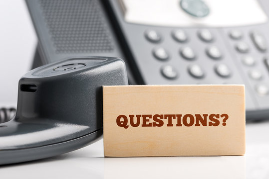 Small Signage for Questions on Telephone Desk